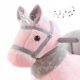 Interaktywny różowy jednorożec konik na biegunach. Personalizowany prezent na roczek dla dziewczynki.