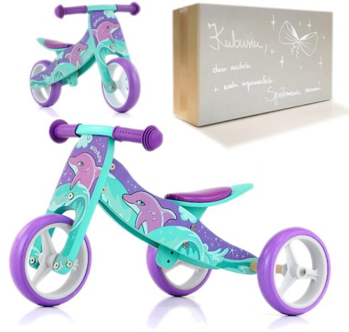 Drewniany jeździk na roczek dla dziewczynki z delfinami Jake Dolphin Milly Mally. W zestawie personalizowane pudełko prezentowe.